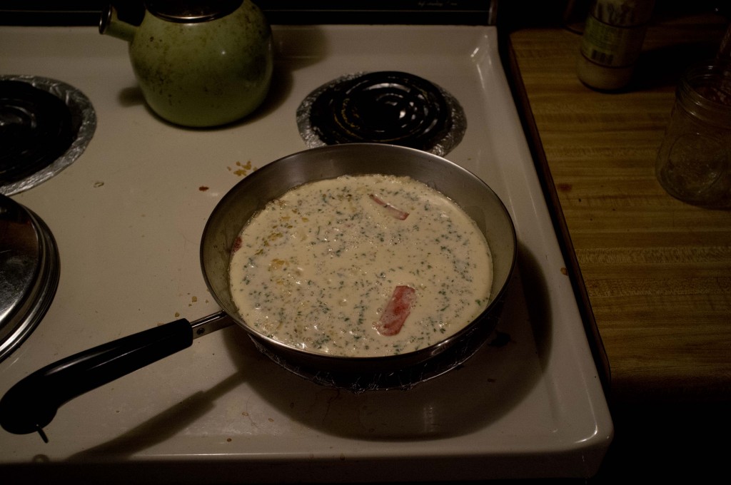 add some savory spice and pour that batter right on in there, on top of that sizzlin' canned meat